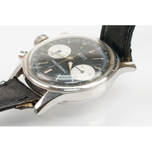 282 - Landeron Chronosport vintage wrist watch. The watch having a black face with silver baton markers to... 