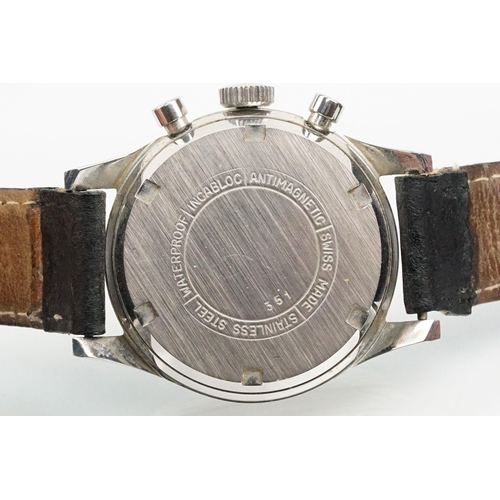 282 - Landeron Chronosport vintage wrist watch. The watch having a black face with silver baton markers to... 