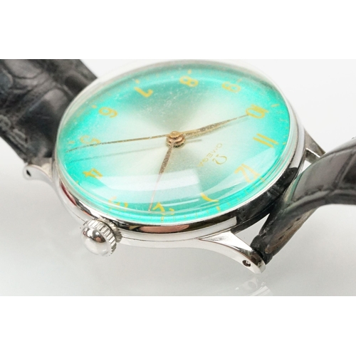 285 - Omega vintage wrist watch having a green dial with yellow arabic numerals to the chapter ring set wi... 