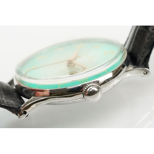 285 - Omega vintage wrist watch having a green dial with yellow arabic numerals to the chapter ring set wi... 