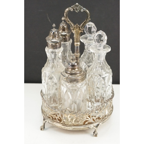 339 - 19th Century Victorian silver hallmarked cruet set having a silver and wooden base with pierced gall... 