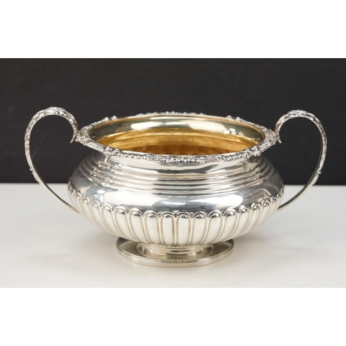 342 - 19th Century William IV silver hallmarked matching sugar bowl and cream jug. Each having gadrooned b... 