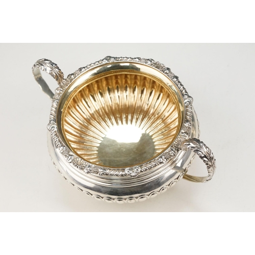 342 - 19th Century William IV silver hallmarked matching sugar bowl and cream jug. Each having gadrooned b... 