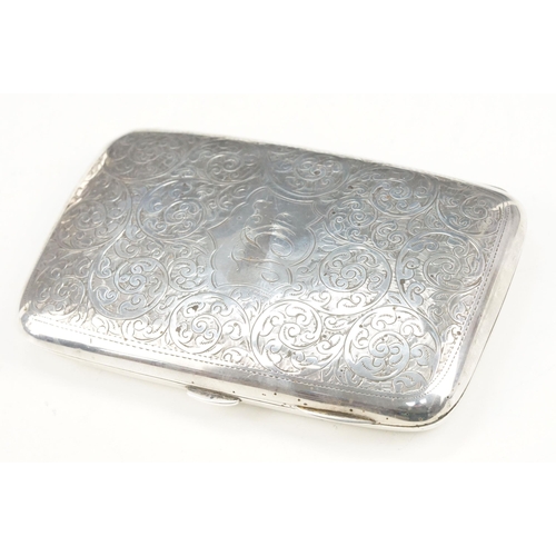 351 - Two silver hallmarked cigarette cases to include a large case with engraved scrolled details and ini... 