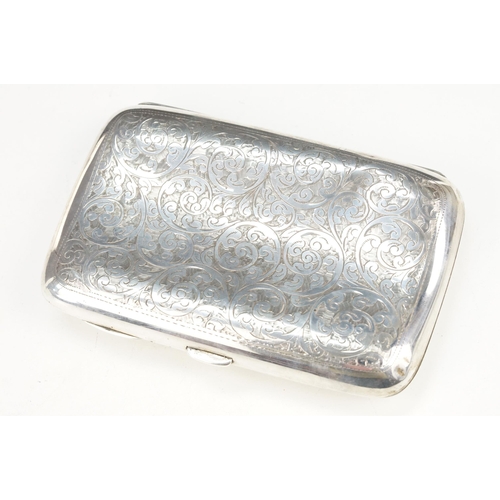 351 - Two silver hallmarked cigarette cases to include a large case with engraved scrolled details and ini... 