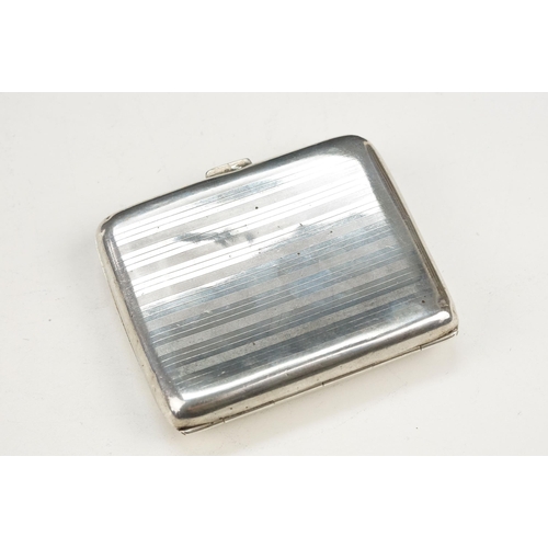 351 - Two silver hallmarked cigarette cases to include a large case with engraved scrolled details and ini... 