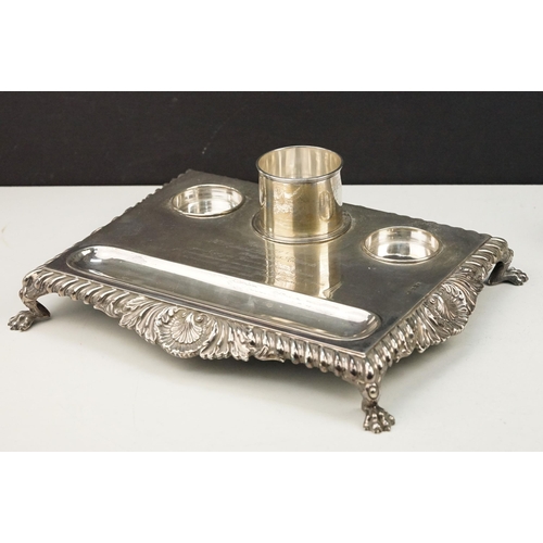 361 - Early 20th Century silver hallmarked ink stand having a silver base with gadrooned borders raised on... 