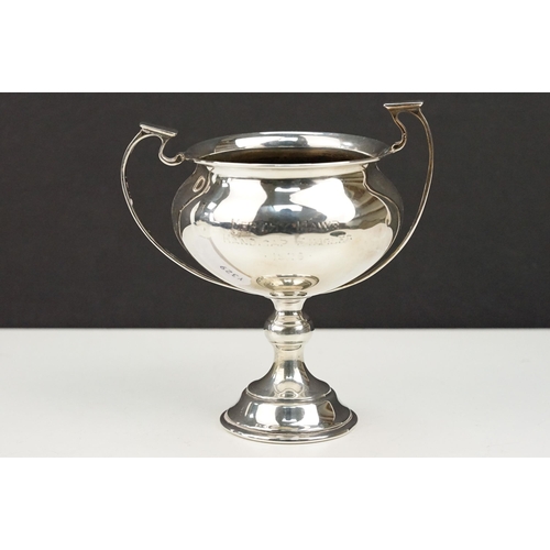 362 - Group of silver items to include a twin handled trophy cup (hallmarked London 1865), an Edwardian ov... 