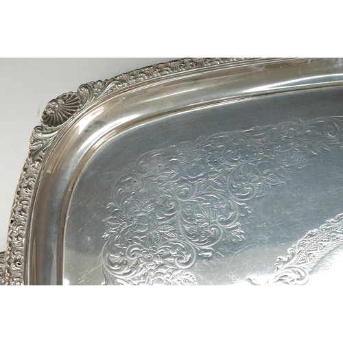 363 - Early 20th Century Edwardian silver serving tray having moulded twin handles with shell and acanthus... 