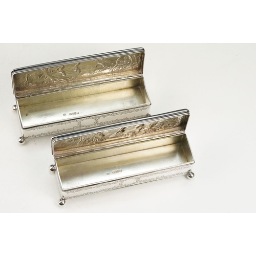 364 - Pair of 19th Century George IV silver boxes to include one with winter repousse scene to the lid, th... 