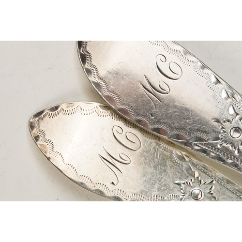 366 - Group of 19th Century silver hallmarked spoons to include a pair of George III serving spoons with b... 