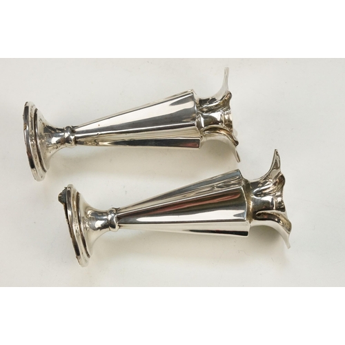 367 - Two pairs of silver hallmarked stem vases each with tapering stems on pedestal bases. Larger pair ha... 