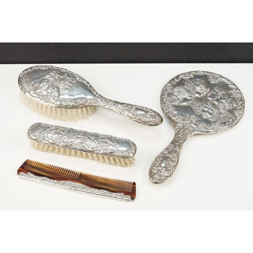 376 - Silver dressing table set including mirror, hair brush, comb and clothes brush. Hallmarked Birmingha... 