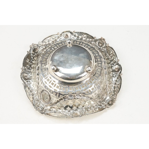 377 - Group of silver dishes to include a pair of round dishes with pierced details (hallmarked 1902, Adie... 