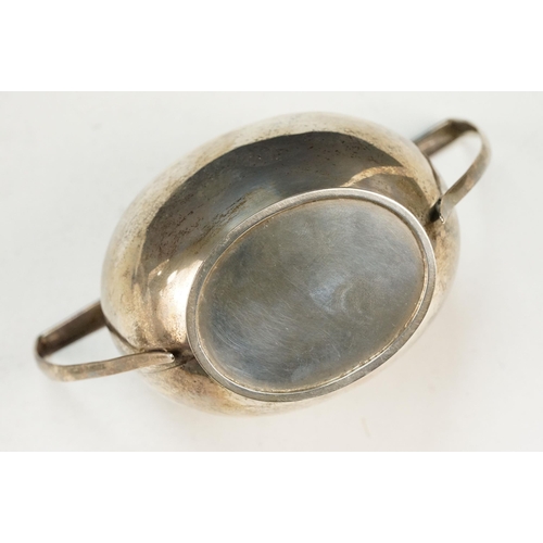 388 - 1920s silver hallmarked twin handled sugar bowl having a gilt interior with two stirrup handles. Hal... 