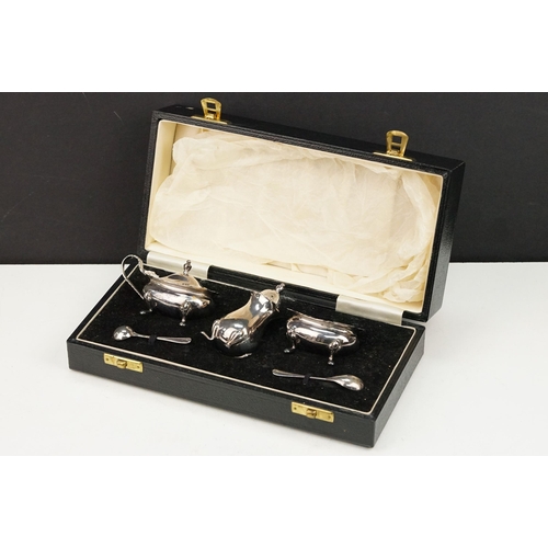 391 - Silver cruet set consisting of mustard pot, table salt and pepper pot. Hallmarked London 1972, A Chi... 