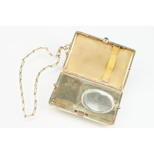 6 - Mid 20th Century 14ct gold ladies compact having an engine turned exterior with floral border and sa... 