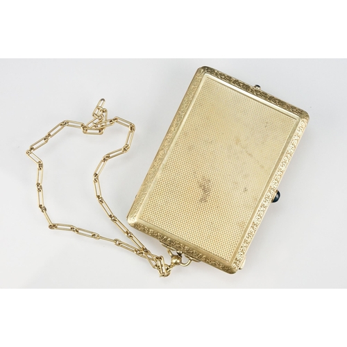 6 - Mid 20th Century 14ct gold ladies compact having an engine turned exterior with floral border and sa... 