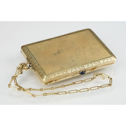 6 - Mid 20th Century 14ct gold ladies compact having an engine turned exterior with floral border and sa... 