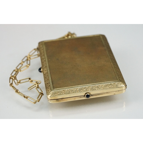 6 - Mid 20th Century 14ct gold ladies compact having an engine turned exterior with floral border and sa... 