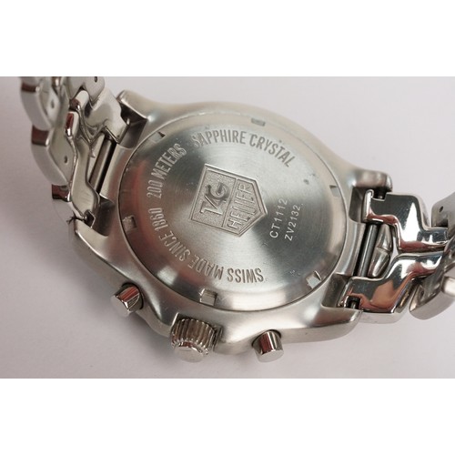 301 - Tag Heuer professional 200m stainless steel wrist watch. The watch having a silvered dial with three... 