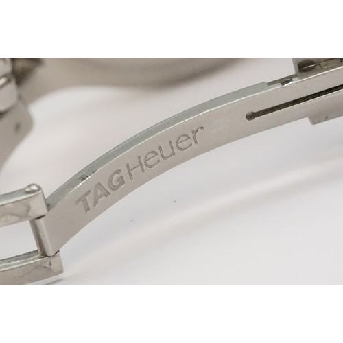 301 - Tag Heuer professional 200m stainless steel wrist watch. The watch having a silvered dial with three... 