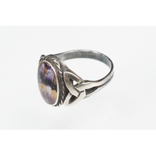 276 - Silver and blue john panel bracelet and ring. The bracelet set with oval panels and pierced Celtic p... 