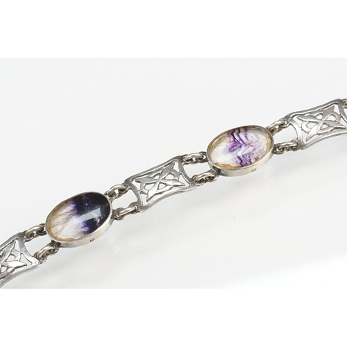 276 - Silver and blue john panel bracelet and ring. The bracelet set with oval panels and pierced Celtic p... 