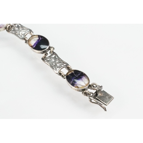 276 - Silver and blue john panel bracelet and ring. The bracelet set with oval panels and pierced Celtic p... 