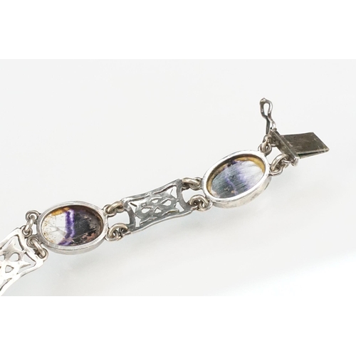 276 - Silver and blue john panel bracelet and ring. The bracelet set with oval panels and pierced Celtic p... 