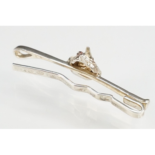 278 - Silver equestrian tie pin in the form of a horse head and whip, Birmingham hallmark, maker RJS