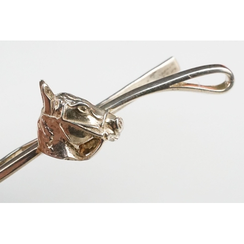 278 - Silver equestrian tie pin in the form of a horse head and whip, Birmingham hallmark, maker RJS