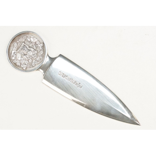 358 - Silver hallmarked letter opener having a round panel handle with moulded detail featuring a figure w... 