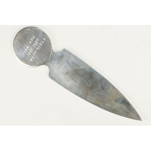 358 - Silver hallmarked letter opener having a round panel handle with moulded detail featuring a figure w... 