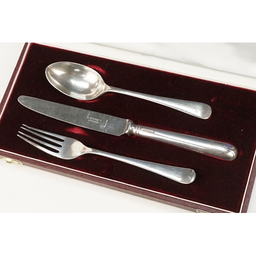 374 - Collection of cased silver hallmarked cutlery to include an Asprey knife, fork and spoon set (hallma... 