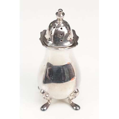 393 - Silver cruet set consisting of mustard pot, table salt and pepper pot. Hallmarked London 1972, A Chi... 