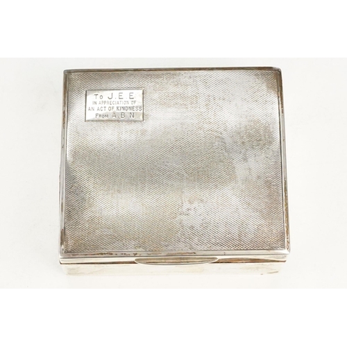 398 - Silver whisky flask together with a silver hallmarked cigarette box. Whisky flask of plain form with... 