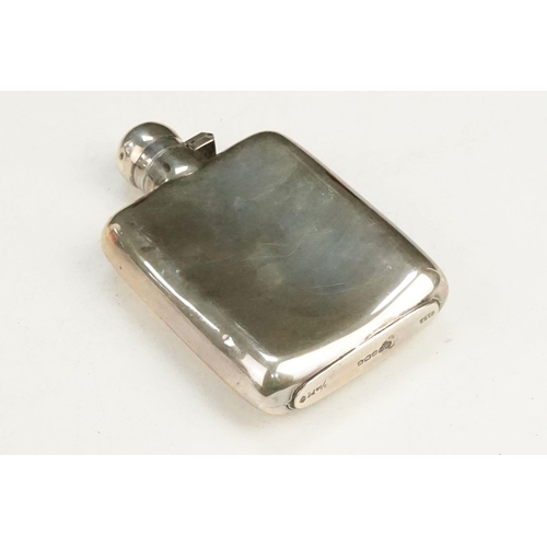 398 - Silver whisky flask together with a silver hallmarked cigarette box. Whisky flask of plain form with... 