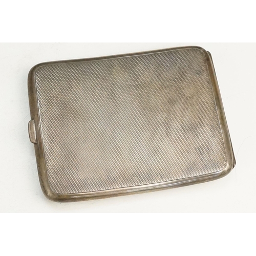 399 - Three silver hallmarked cigarette cases to include an engine turned cigarette case (hallmarked Birmi... 