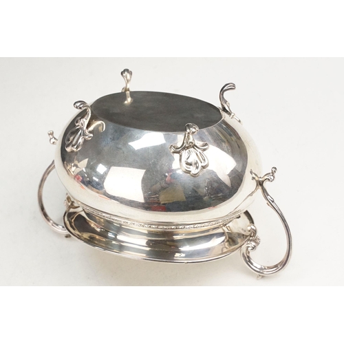 400 - Early 20th Century silver tea set comprising teapot, hot water pot and sugar bowl with ebonised wood... 