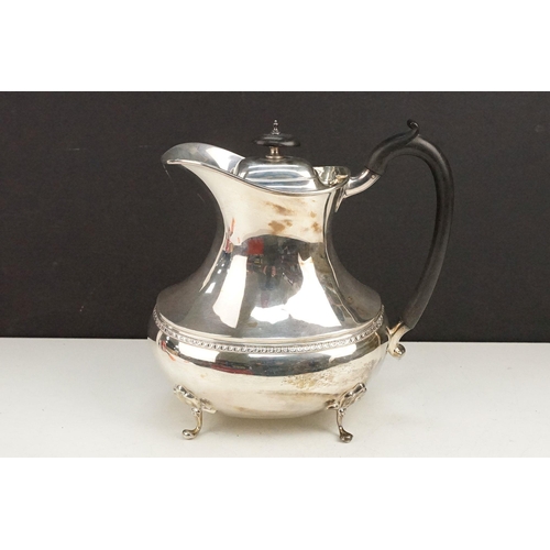 400 - Early 20th Century silver tea set comprising teapot, hot water pot and sugar bowl with ebonised wood... 