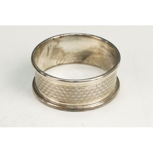 401 - Collection of silver to include a French silver napkin ring (minerva mark to rim), two hallmarked si... 