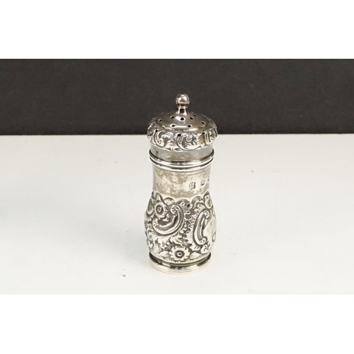 402 - Group of silver to include a blue glass lined pepper pot (hallmarked Exeter 1847), silver repousse p... 