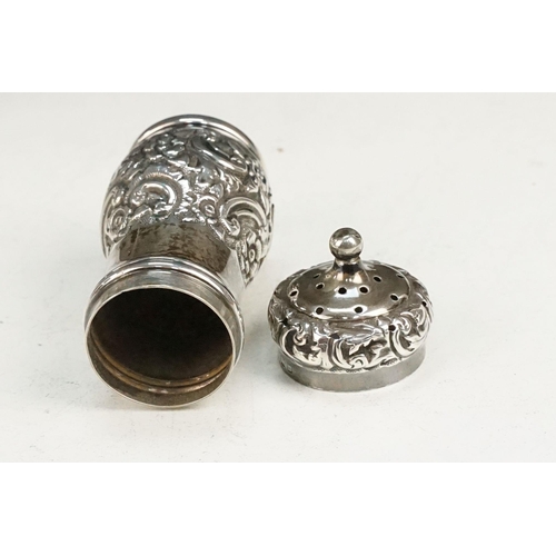 402 - Group of silver to include a blue glass lined pepper pot (hallmarked Exeter 1847), silver repousse p... 