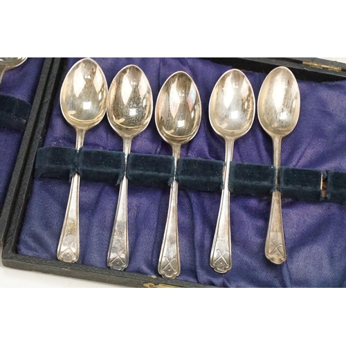 409 - Collection of 23 Walker & Hall silver hallmarked teaspoons having crossed golf clubs to the terminal... 