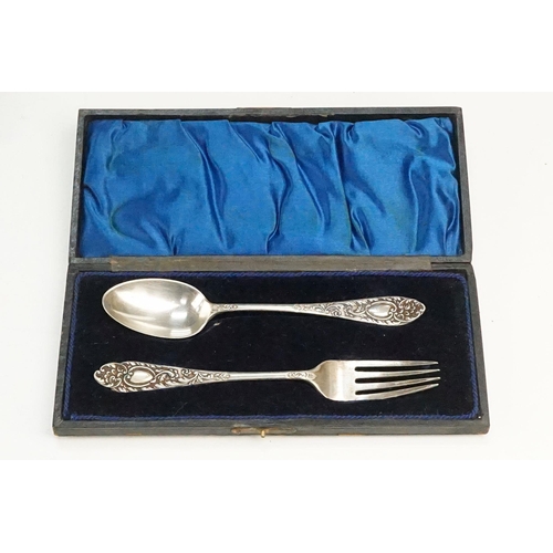 409 - Collection of 23 Walker & Hall silver hallmarked teaspoons having crossed golf clubs to the terminal... 