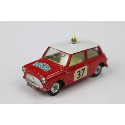 20 - Boxed Corgi 317 Monte Carlo BMC Mini Cooper diecast model in red with white roof and pale yellow int... 