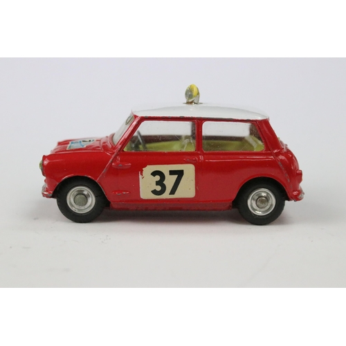 20 - Boxed Corgi 317 Monte Carlo BMC Mini Cooper diecast model in red with white roof and pale yellow int... 