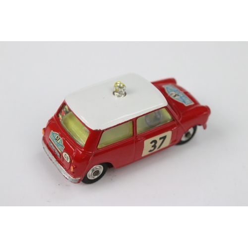 20 - Boxed Corgi 317 Monte Carlo BMC Mini Cooper diecast model in red with white roof and pale yellow int... 