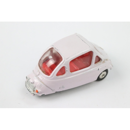 22 - Boxed Corgi 233 Heinkel Economy Car diecast model in pale pink with red interior, diecast showing pa... 